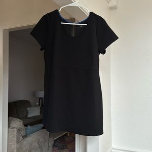 Motherhood short sleeve top. Zipper detail on back.